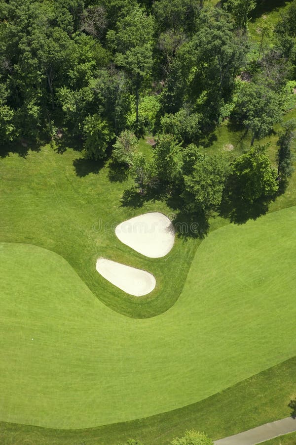Aerial view of a golf fairlway and bunkers royalty free stock photos