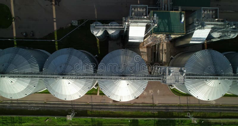 Aerial view of grain storage tanks.