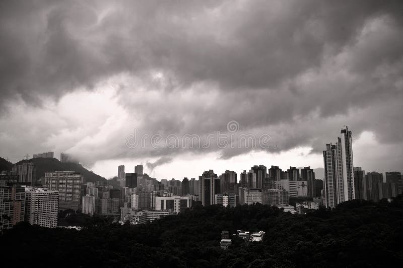 Aerial view of heavy clouds and hong kong skyline royalty free stock image