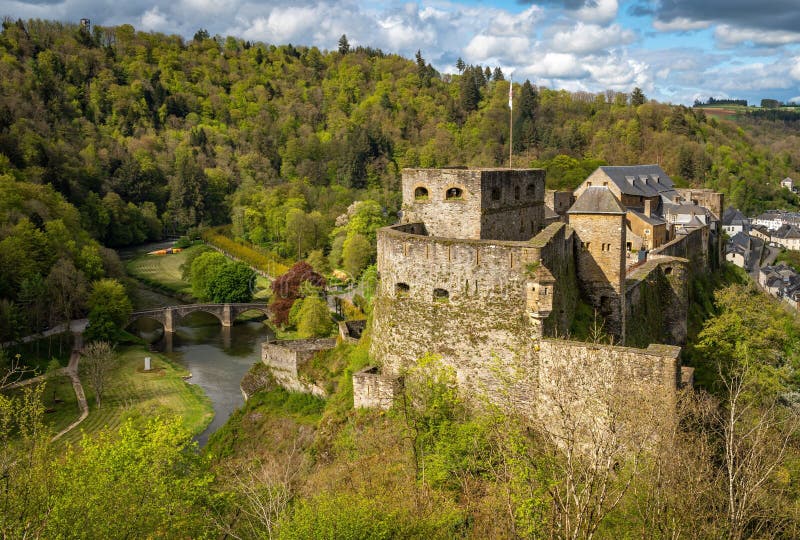 An aerial view of the historic Bouillon Castle and the forests of Belgian Ardennes