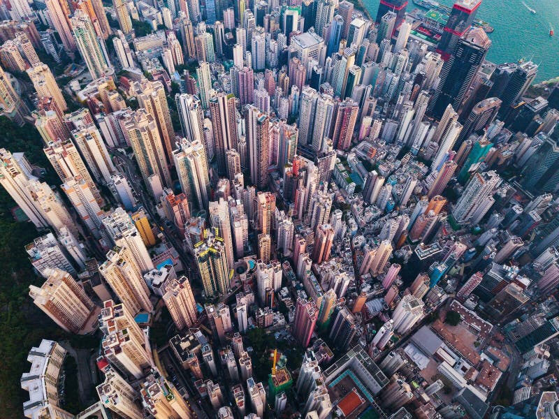 Aerial view of Hong Kong Downtown. Financial district and business centers in smart city in Asia. Top view of skyscraper and high