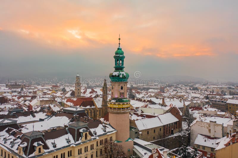 Aerial view about the iconic Fire tower in Sopron downtown. Splendid winter sunset at the background.