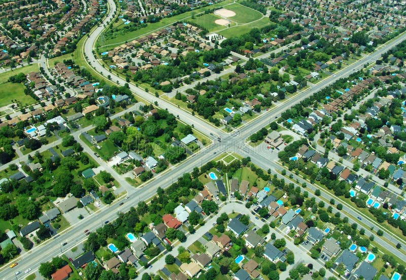 Aerial view of intersection in residential area stock images