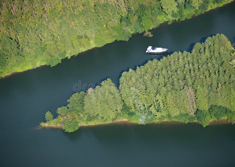 Aerial view : isolated boat on a river