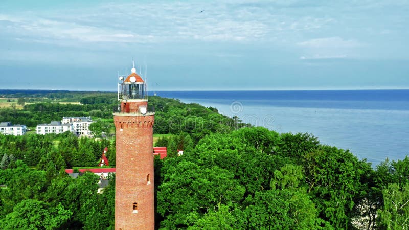 Aerial view of lighthouse by Baltic Sea in Poland