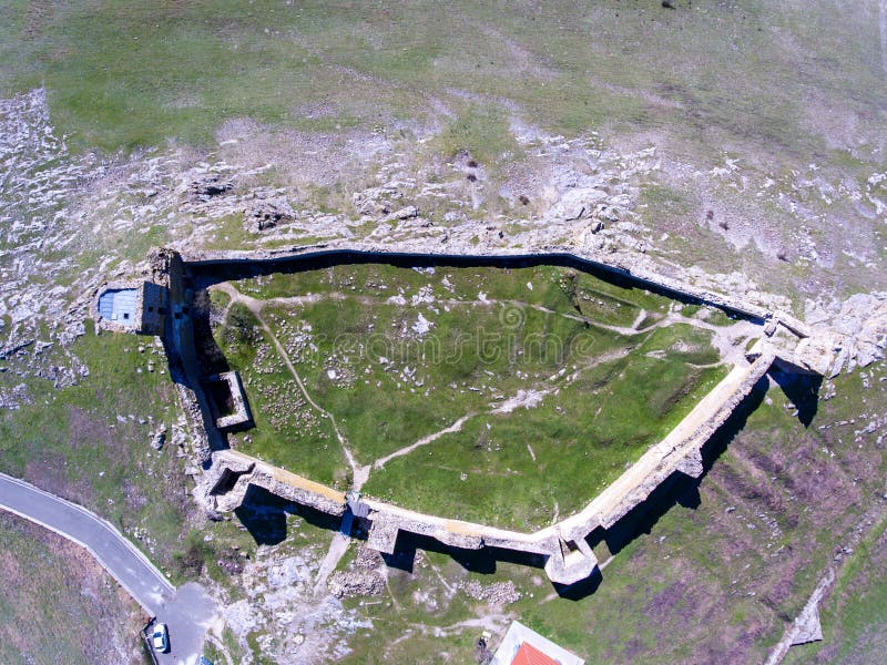 Aerial view of medieval fortress Enisala Yenisale. Top down view.