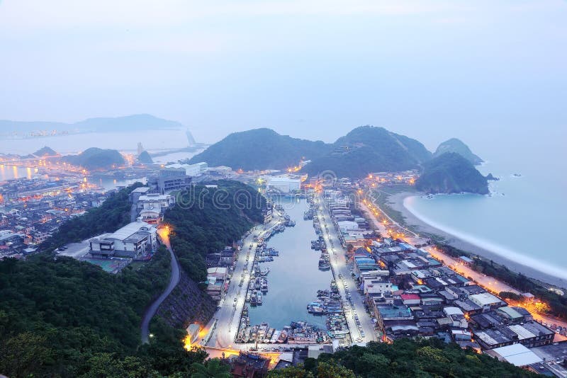 Aerial view of misty sunrise at Nanfangao harbor, a fishing village northeast to Taipei Taiwan ~