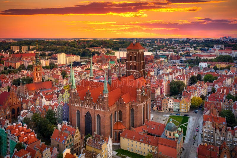 Aerial view of the old town in Gdansk with St. Mary Basilica at sunset, Poland
