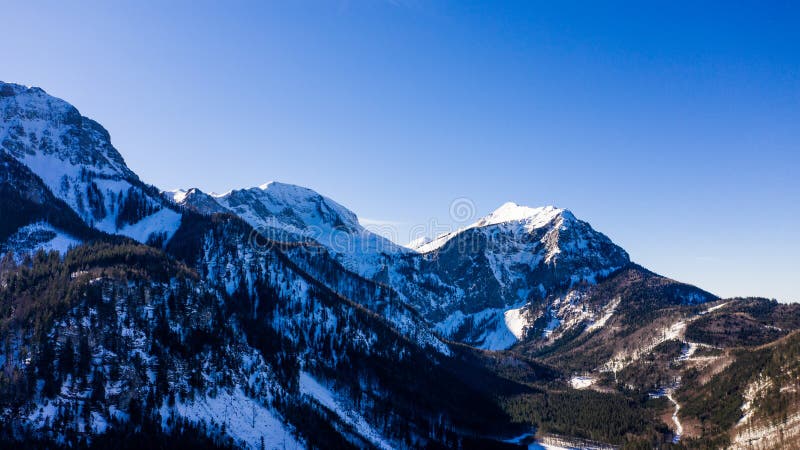 Aerial view over the beautiful Austrian alps in Europe. winter season landscape drone photography in austria. great mountains in