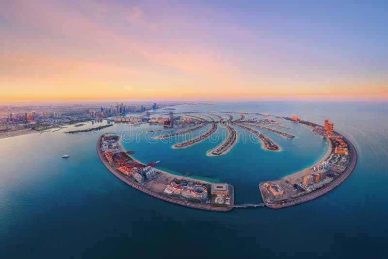 Aerial view of The Palm Jumeirah Island, Dubai Downtown skyline, United Arab Emirates or UAE. Financial district and business area