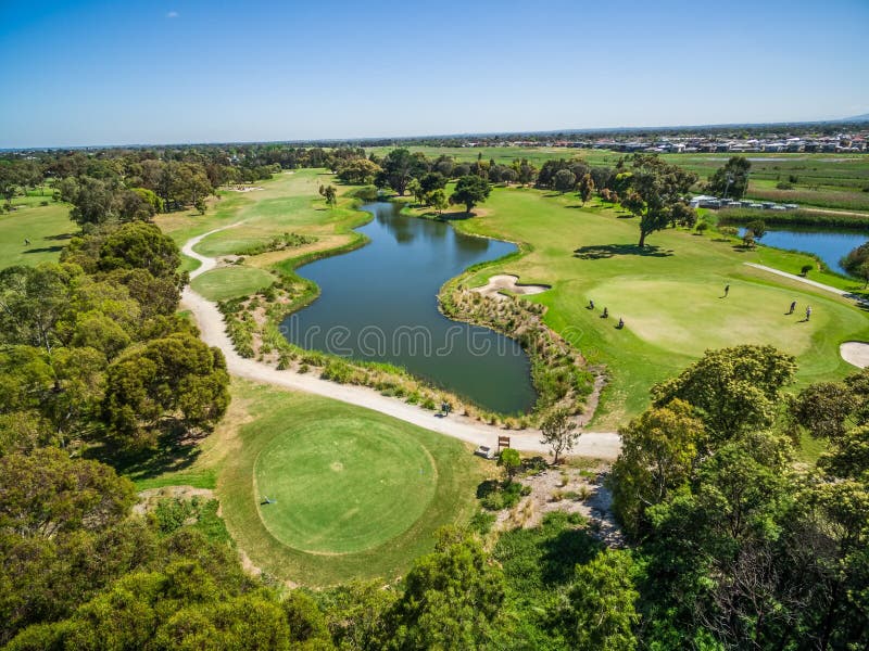 Aerial view of Patterson River Golf Club and golfers on a bright sunny day. Melbourne, Australia. Aerial view of Patterson River Golf Club and golfers on a bright sunny day. Melbourne, Australia.