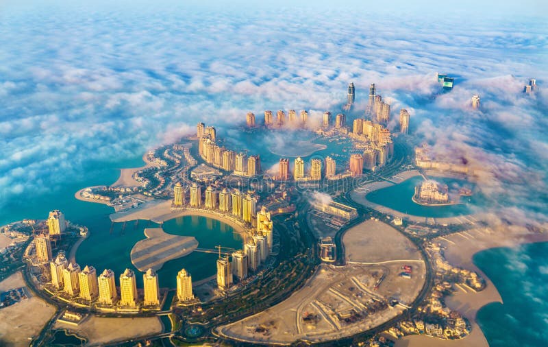 Aerial view of the Pearl-Qatar island in Doha through the morning fog - Qatar, the Persian Gulf