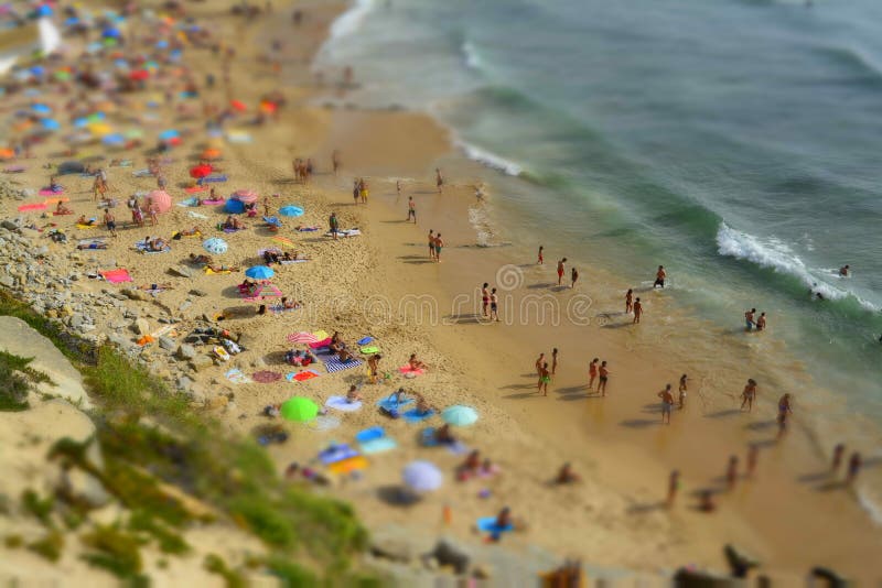 People relaxing On ocean portugal beach stock photos People relaxing On ocean portugal beach stock photos