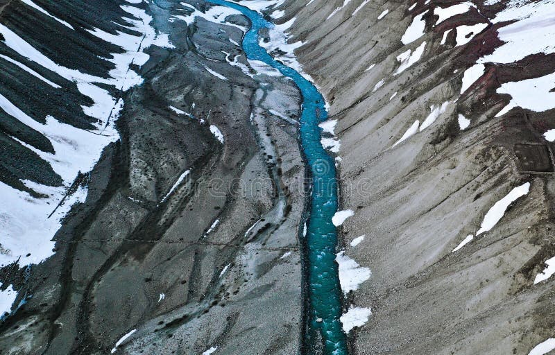 Aerial view of Pin river flowing down the rough terrain of Pin valley National Park