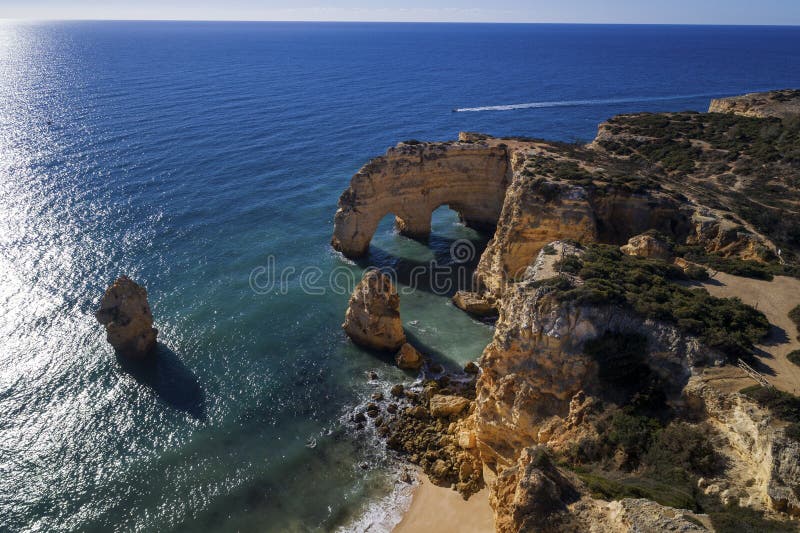 Aerial view of the Praia da Marinha Marinha Beach in the beautiful coast along Lagoa stock photo Aerial view of the Praia da Marinha Marinha Beach in the beautiful coast along Lagoa stock photo