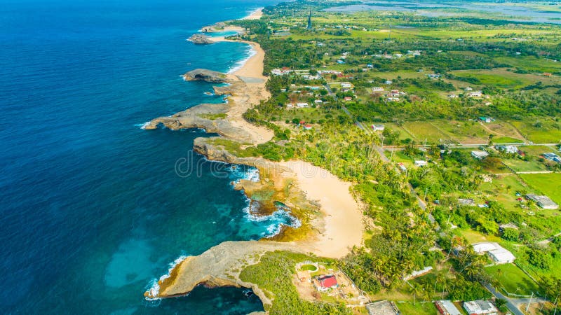 Aerial view of Puerto Rico. Faro Los Morrillos de Cabo Rojo. Playa Sucia beach and Salt lakes in Punta Jaguey.