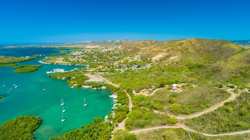 Aerial view of Puerto Rico. Faro Los Morrillos de Cabo Rojo. Playa Sucia beach and Salt lakes in Punta Jaguey.