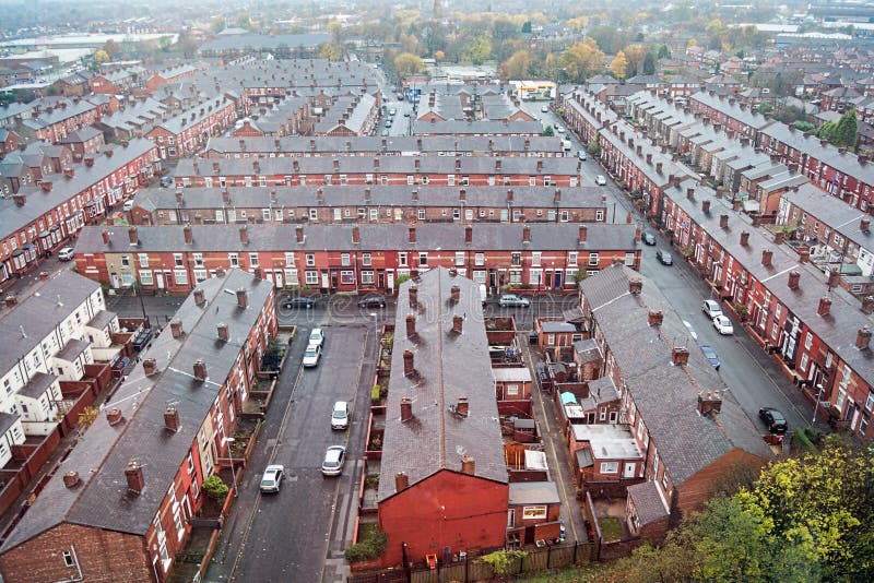 Seen from above, the stern rows of rooftop houses in Gorton, Manchester.  Stock Image - Autumn Photo, Houses: 164044409