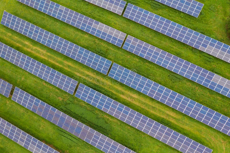 Aerial view of rows of solar panels in a field royalty free stock photography