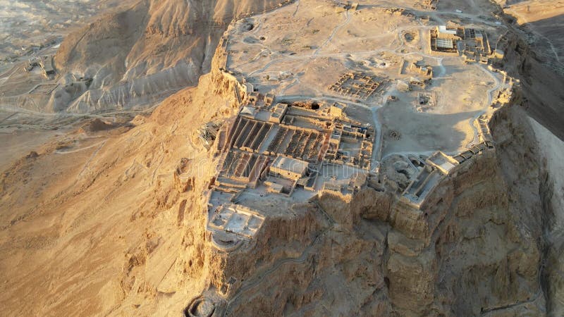 Aerial view of the ruins of Massada is a fortress built by Herod the Great on a cliff-top off the coast of the Dead Sea. Destroyed