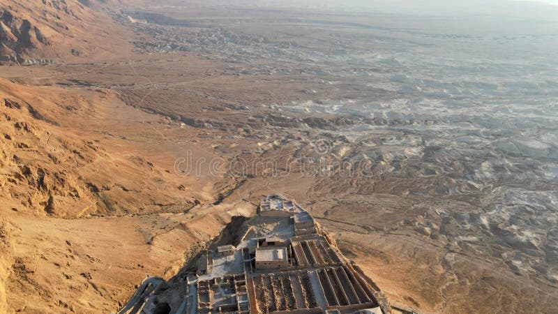 Aerial view of the ruins of Massada is a fortress built by Herod the Great on a cliff-top off the coast of the Dead Sea. Destroyed