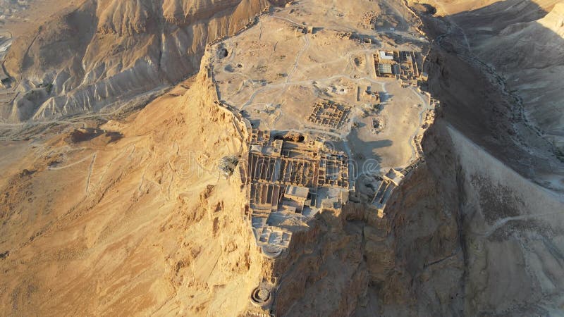 Aerial view of the ruins of Massada is a fortress built by Herod the Great on a cliff-top off the coast of the Dead Sea. Destroyed