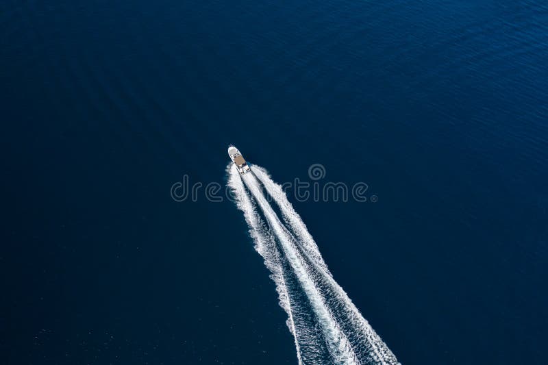 Aerial view of speed motor boat on open sea