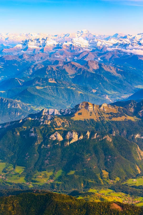 Aerial view on the Swiss Alps with snow peaks