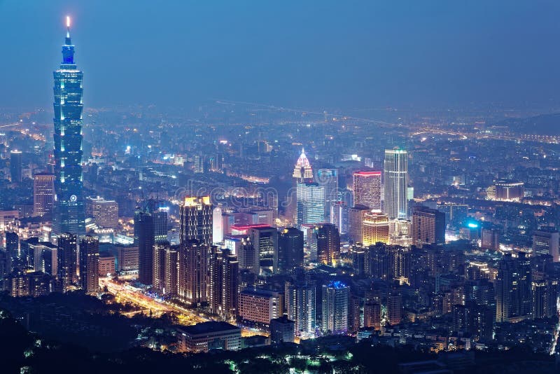 Aerial view of Taipei City in evening twilight with Taipei landmark standing tall among skyscrapers in Xinyi Commercial District stock photos Aerial view of Taipei City in evening twilight with Taipei landmark standing tall among skyscrapers in Xinyi Commercial District stock photos