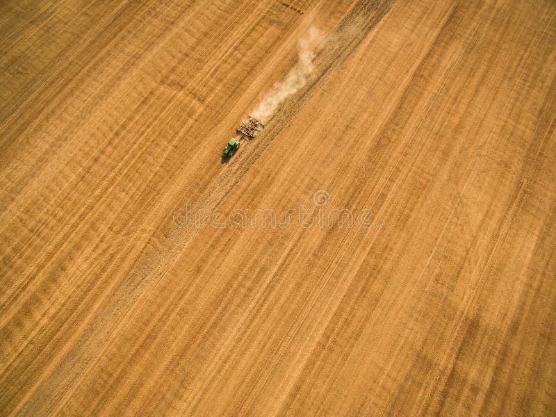 Aerial view of a tractor working a field