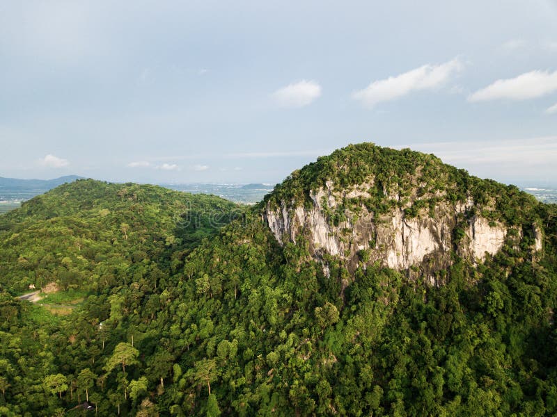 Aerial view, tropical forest on the mountain with blue sky royalty free stock images