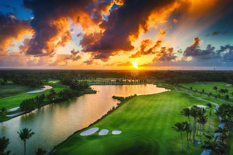 Aerial view of tropical golf course at sunset, Dominican Republic, Punta Cana. Aerial view of tropical golf course at sunset, Dominican Republic, Punta Cana