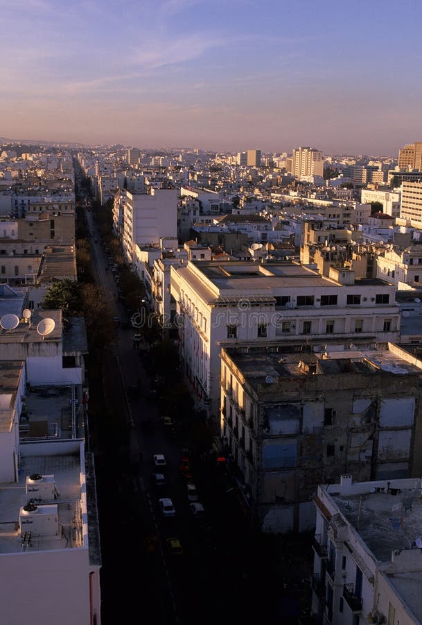 Buildings of downtown Tunis illuminated at sunset- Tunis, Tunisia. Buildings of downtown Tunis illuminated at sunset- Tunis, Tunisia.