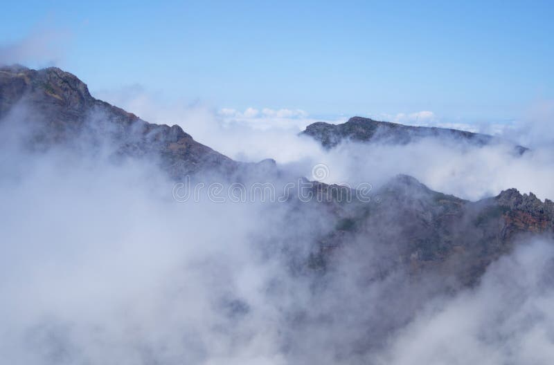 Aerial view of volcanic peaks emerging from the clouds, Pico do Arieiro, Madeira Portugal stock photos Aerial view of volcanic peaks emerging from the clouds, Pico do Arieiro, Madeira Portugal stock photos