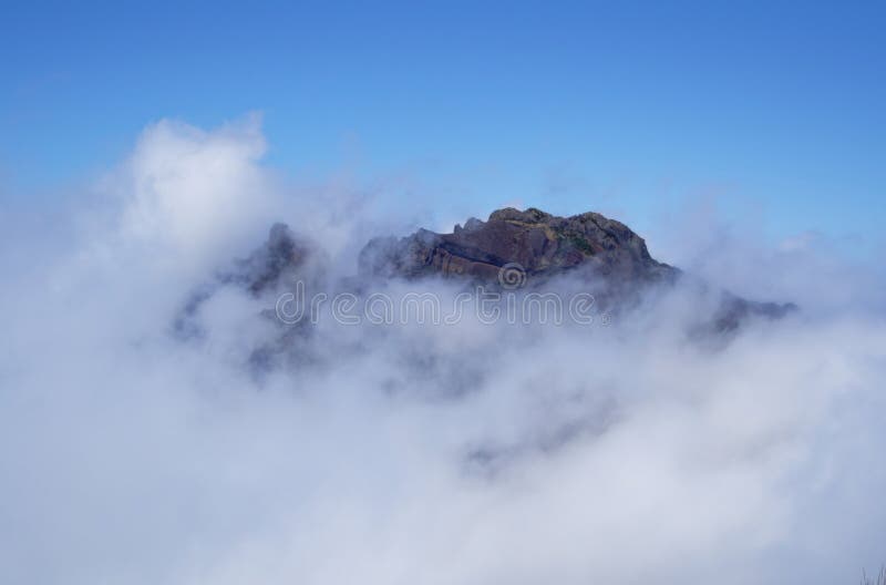 Aerial view of volcanic peaks emerging from the clouds, Pico do Arieiro, Madeira Portugal stock photo Aerial view of volcanic peaks emerging from the clouds, Pico do Arieiro, Madeira Portugal stock photo