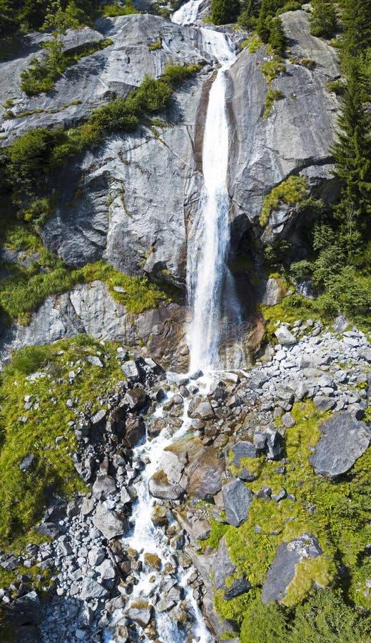 Aerial view of a waterfall in Val di Mello. Val Masino, Valtellina, Sondrio. Italy