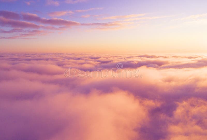 Aerial view White clouds in blue sky. Top view. View from drone. Aerial bird`s eye view. Aerial top view cloudscape. Texture of c