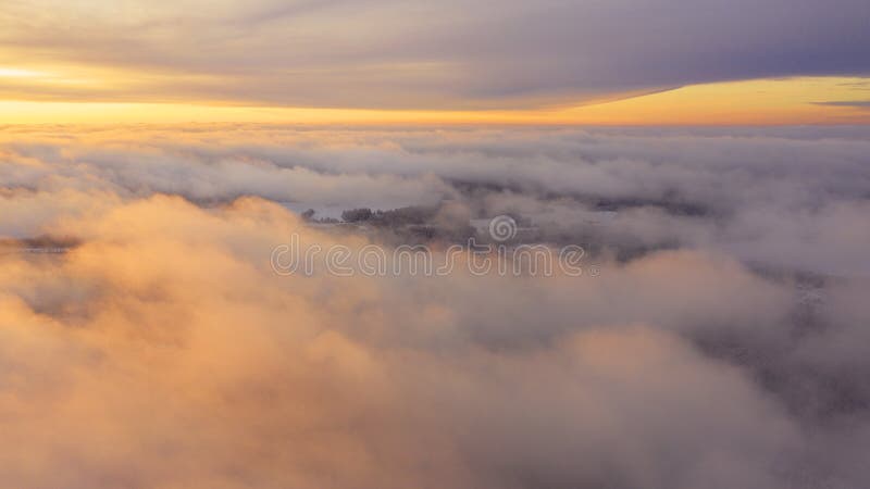 Aerial view White clouds in blue sky. Top view. View from drone. Aerial bird`s eye view. Aerial top view cloudscape. Texture of c