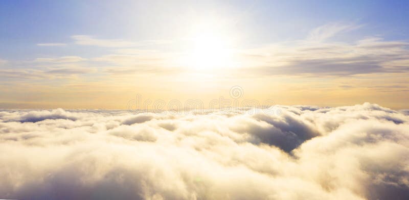 Aerial view White clouds in blue sky. Top view. View from drone. Aerial bird`s eye view. Aerial top view cloudscape. Texture of c