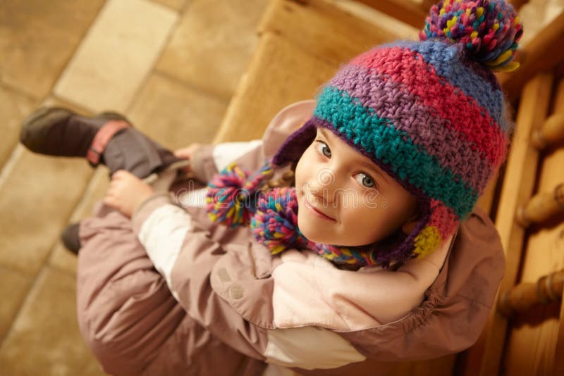 Aerial View Of Young Girl Sitting On Wooden Seat