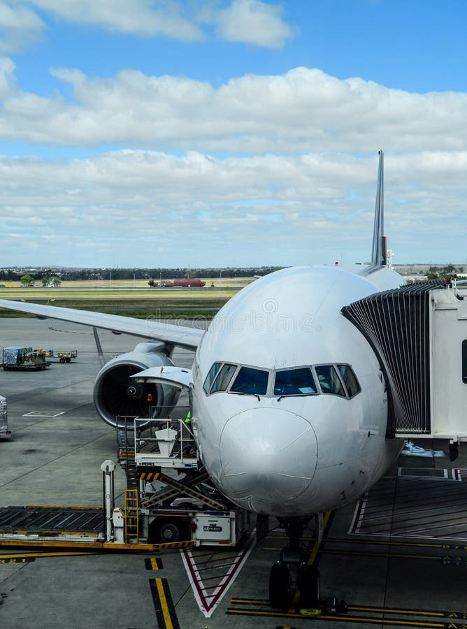 Aeroplane at arrival terminal aerobridge