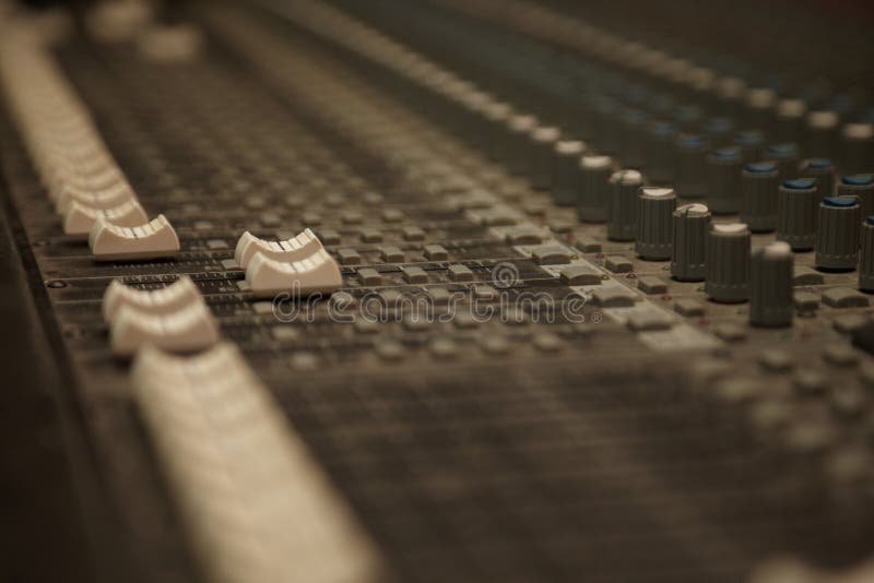 Faders of dusty sound mixer. depth resolution. two faders in focus. Faders of dusty sound mixer. depth resolution. two faders in focus