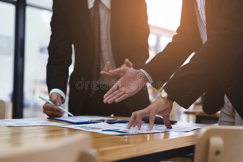 Two business discussing corporate financial report,board of directors planning project.Business Analysis and Strategy concept. Two business discussing corporate financial report,board of directors planning project.Business Analysis and Strategy concept