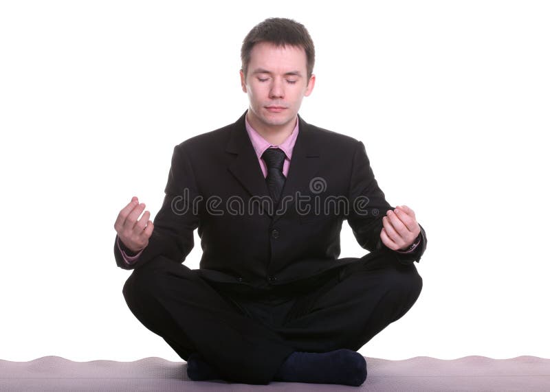 affärsman som gör yoga royaltyfria bilder affärsman som gör yoga royaltyfria bilder
