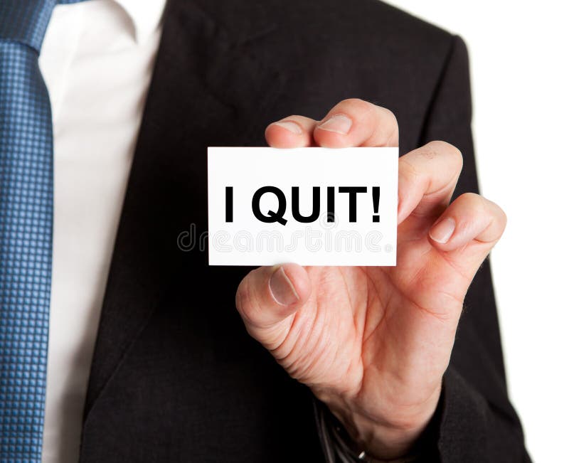 Closeup of businessman showing card with I quit sign. Closeup of businessman showing card with I quit sign