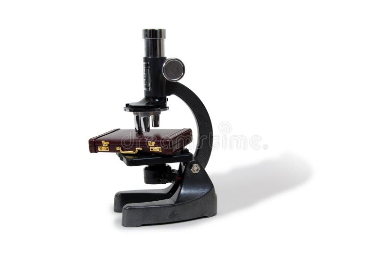 Small Microscope used in scientific research, with Burgandy leather Briefcase used to carry items to the office. Small Microscope used in scientific research, with Burgandy leather Briefcase used to carry items to the office