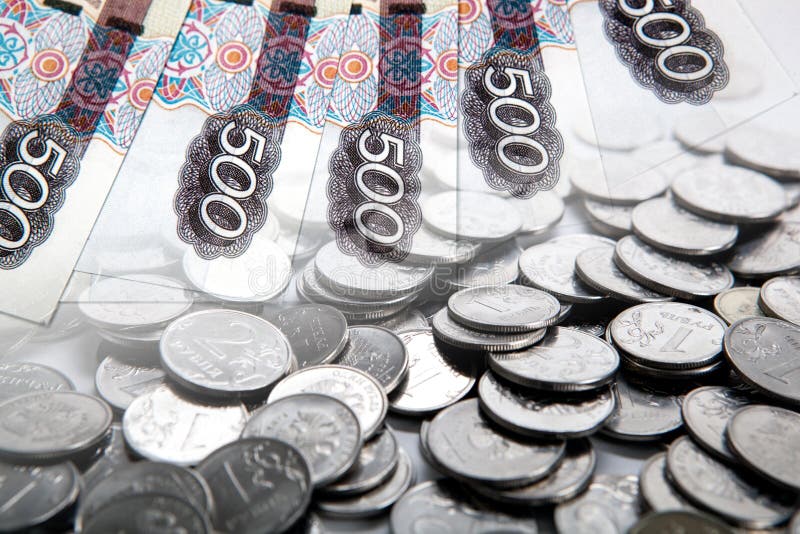 Business still life of money ruble bills and ruble coins close up. Business still life of money ruble bills and ruble coins close up