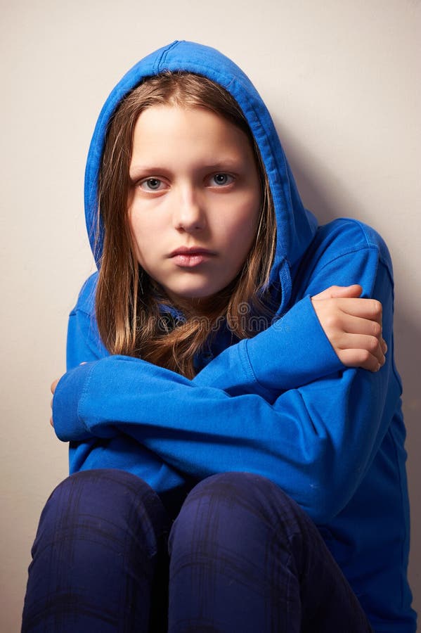 Afraided teen girl in hood stock photo. Image of fearful - 41629280