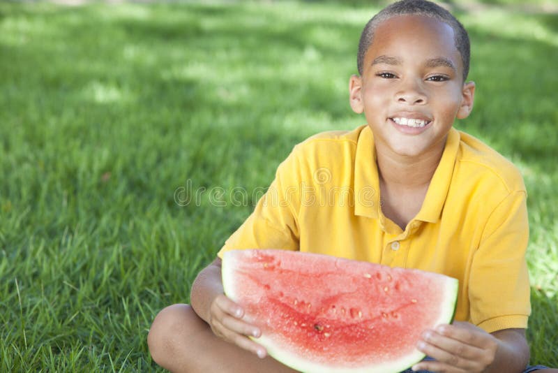 African American Boy Child Eating Water Melon Stock Photo Image of