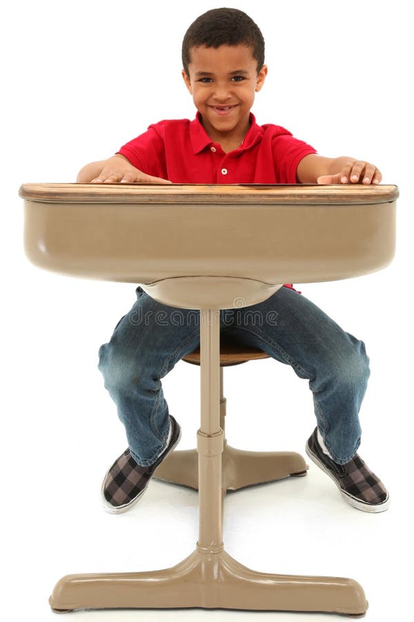 African American Boy Sitting In A Desk stock photos African American Boy Sitting In A Desk stock photos